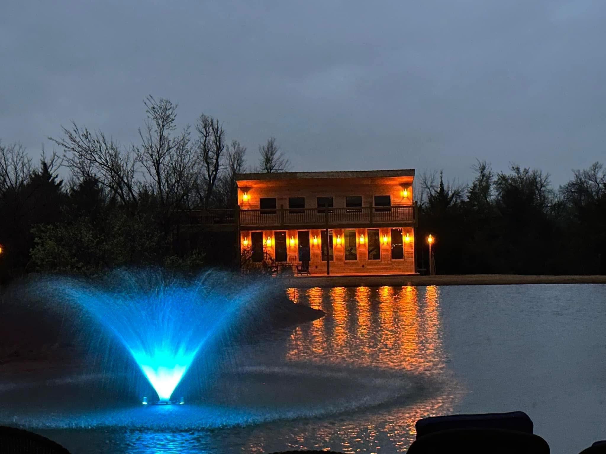 Completed pond with lit fountain at the Tiger Safari build
